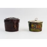 An early 20th century army and navy campaign spirit stove and saucepan, the cylindrical stove and