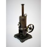 An early 20th century live steam model vertical stationary engine, the cylindrical copper tank
