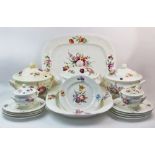 A Coalport part dinner service, 19th century, comprising: three tureens and covers, 25cm high,