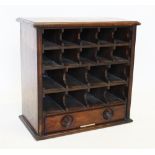A late 19th century mahogany apothecary cabinet, Ferris & Co, Bristol, formed with an arrangement of