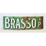 A vintage enamel sign for Brasso polish, the logo in a white faux relief serif font against a