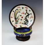 A Japanese cloisonne bowl, 20th century, the circular bowl with bronze rim and foot, decorated in
