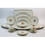 A Haviland Limoges tea and breakfast service, comprising: a serving tray, two graduated platters,