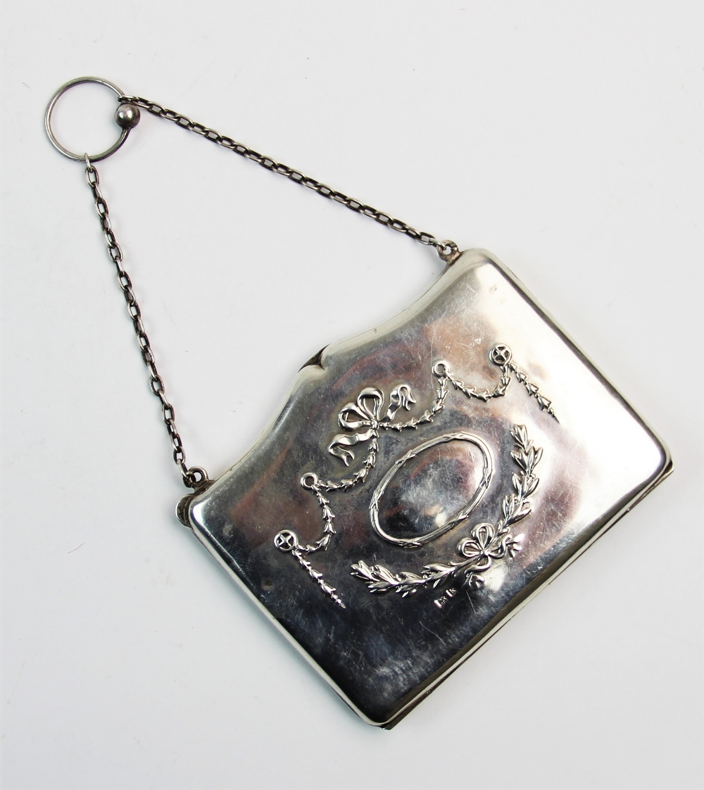 An Edwardian silver purse, Henry Matthews, Birmingham 1909, of typical form, with garland swag and - Image 2 of 3