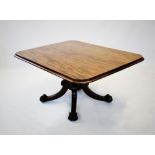 A mid 19th century mahogany breakfast table, the rectangular tilt top with a thumb moulded border