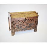 An 18th century Eastern European riven beech wood arc or coffer, the sloping hinged cover, front and