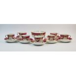 A Victorian floral pattern tea service, 19th century, comprising: eight tea cups, five coffee