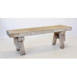 A 19th century slab top pig bench, the rectangular top on four angled legs of square section, 46cm H