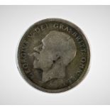 A George V wreath crown, 1930, date in wreath verso, card mounted and a George II half crown,