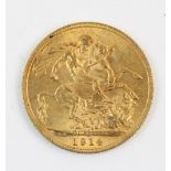 A George V sovereign, dated 1914, weight 8.0gms