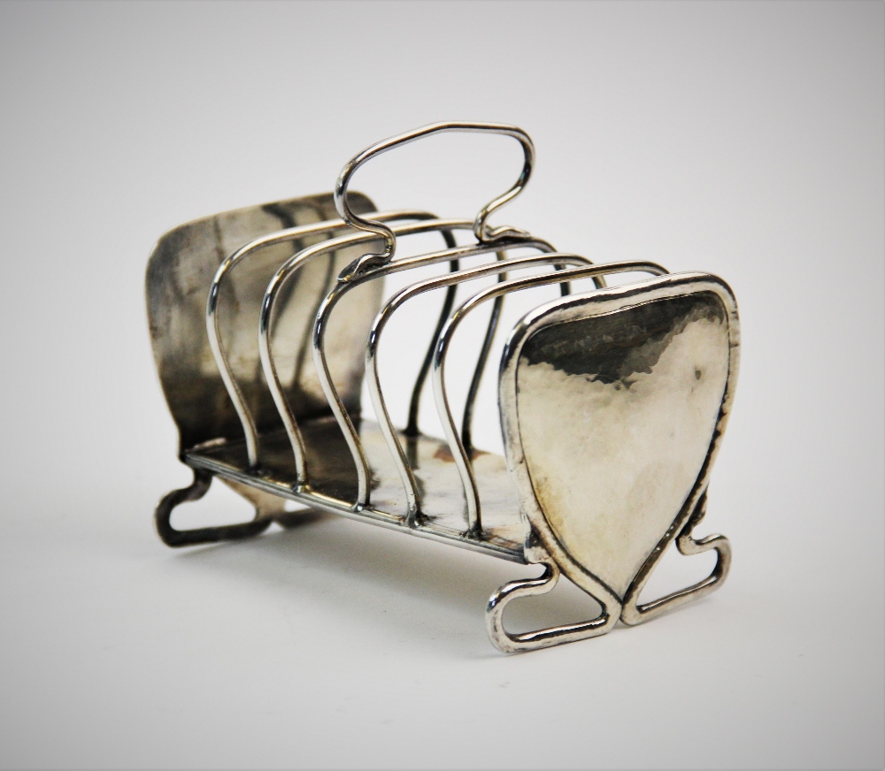 An Art Nouveau silver toast rack, Keswick School of Industrial Art, Chester 1906, the six slice rack - Image 2 of 20