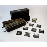 A large quantity of glass magic lantern slides, mid 19th century and later, depicting a range of