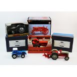 Seven assorted tractor die cast models, to include, two Ferguson System LTX tractors, a boxed