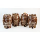Three salt glazed stoneware barrels, each with applied Prince Of Wales coat of arms and feathers,