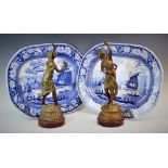 A pair of 19th century blue and white earthenware meat plates by Wood & Sons, each depicting figures