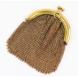 A lady's 9ct gold chain mesh purse, the arched cantle with snap fastening, import marks for