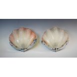 A pair of Art Deco frosted glass clam shell wall lights, each mounted within a chromed wall