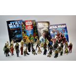 A collection of fifty nine Star Wars model figures, to include Darth Vader with vinyl cape, Han