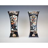A pair of Japanese Imari porcelain vases, Meiji period, the vases of waisted rectangular form,