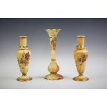 A pair of Royal Worcester blush ivory bud vases, shape number 1726, each with puce maker's mark