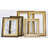 A pair of decorative gilt frames, early 20th century, each rectangular body with rope twist