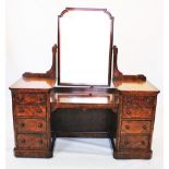 A Victorian burr walnut twin pedestal dressing table, with a shaped mirror above a dropped centre