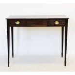 A George III mahogany breakfront side table, with three frieze drawers, the central drawer with