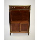 A late 19th French yew wood secretaire abattant, later converted to a drinks cabinet, the shaped