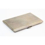 A George VI silver cigarette case, Walker & Hall, Sheffield 1951, of rectangular form, with engine