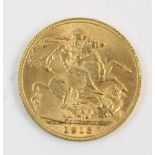 A George V sovereign, dated 1913, gross weight 7.9gms
