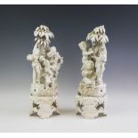 A pair of Capodimonte pearlware figural groups, each of bacchanalian design depicting young