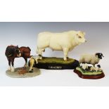 A Naturecraft 'Best of breed' model of a Charolais bull, mounted upon an oval hardwood plinth,