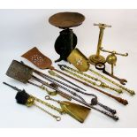 An Arts and Crafts brass spherical fire implement stand in the manner of Christopher Dresser,