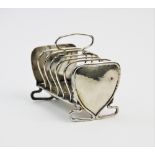 An Art Nouveau silver toast rack, Keswick School of Industrial Art, Chester 1906, the six slice rack