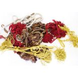 A collection of rope curtain tie-backs to include, gold, red, mustard, aubergine and silver