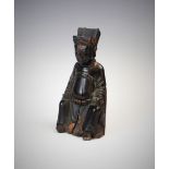 A Chinese carved wood lacquered figure of a seated emperor, 18th/19th century, bearing a