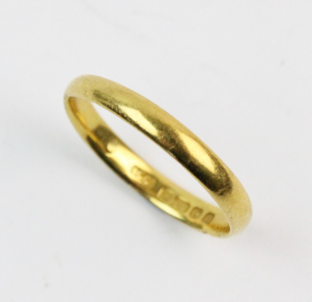 A 22ct gold wedding band, plain polished exterior, ring size L, weight 2.3gms