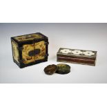 A Japanese lacquered Kodansu, Meiji period, decorated with flora, fauna and figural scenes, of