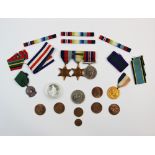 A World War II medal group, comprising: a 1939-1945 Star, an Atlantic Star and a 1939-1945 War