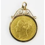 A shield back half sovereign, dated 1865, set to a 9ct gold pendant mount, gross weight 5.2gms