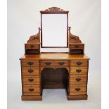 A late Victorian walnut kneehole dressing table by Lamb of Manchester, the rectangular bevelled