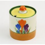 A Clarice Cliff for Newport Pottery Bizarre range Crocus pattern preserve jar and cover, early