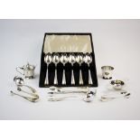 A selection of silver and silver coloured items, to include, a pair of George III silver sugar nips,