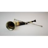 A George V silver candle snuffer, E Baker & Son, Chester 1925, modeled as a hunting horn, 31cm long,