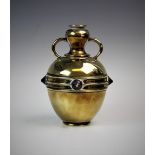 A brass arts and crafts two handled vase, applied with four enamelled prunts, possibly trench art,