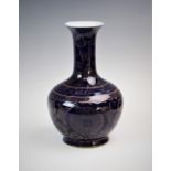 A cobalt blue Chinese vase, 20th century, of compressed baluster form with extending neck, decorated