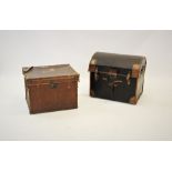 A late 19th century leather travel trunk, the rectangular trunk with leather side loop handles