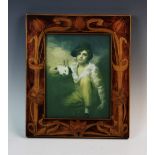 An early 20th century painted rectangular picture frame, the frame adorned with stylised scrolling