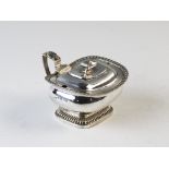 A George III silver double salt, London 1813, of pedestal form with reeded rims, urn finial and