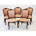 A set of eight Louis XV style walnut framed dining chairs,